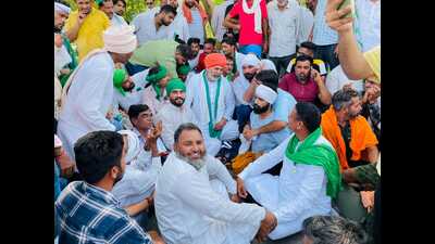 Farmer leaders, including Rakesh Tikait and Balbir Singh Rajewal, announced from the stage that they will support whatever decision is taken by the local farmers. After repeated meetings with the district administration failed to yield results, farmer leaders gave a call to block the NH 44. Thousands of farmers on their tractor-trailers reached the highway and blocked the traffic movement by parking their vehicles. (HT Photo) Farmer leaders, including Rakesh Tikait and Balbir Singh Rajewal, announced from the stage that they will support whatever decision is taken by the local farmers. After repeated meetings with the district administration failed to yield results, farmer leaders gave a call to block the NH 44. Thousands of farmers on their tractor-trailers reached the highway and blocked the traffic movement by parking their vehicles. (HT Photo)