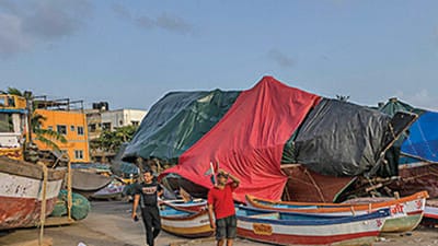 Fishing boats are anchored at Juhu Koliwada in Mumbai, India on Monday. (AP) Fishing boats are anchored at Juhu Koliwada in Mumbai, India on Monday. (AP)