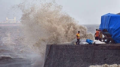 High tides crash at the seafront at Colaba, Mumbai as an after-effect of the forming of the cyclone. (PTI) High tides crash at the seafront at Colaba, Mumbai as an after-effect of the forming of the cyclone. (PTI)