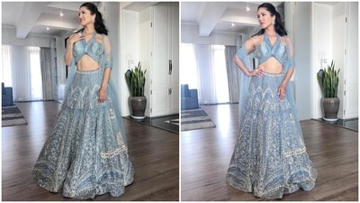 For her first wedding function visit with her family, Sunny Leone wore a lehenga set from the shelves of the clothing label Chamee and Palak. She chose an ice blue lehenga set from their collection, featuring a bralette-style blouse, skirt and a net dupatta. (Instagram) For her first wedding function visit with her family, Sunny Leone wore a lehenga set from the shelves of the clothing label Chamee and Palak. She chose an ice blue lehenga set from their collection, featuring a bralette-style blouse, skirt and a net dupatta. (Instagram)