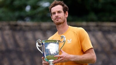 Andy Murray celebrates with the trophy after winning the final match against Austria's Jurij Rodionov (Reuters)