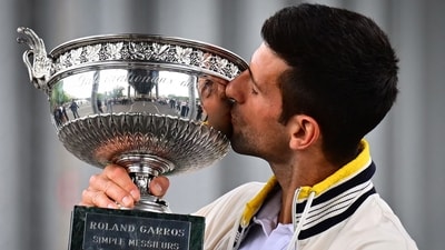Serbia's Novak Djokovic kisses the Musketeers' Trophy during a photocall after winning the Roland-Garros French Open tennis tournament (AFP) Serbia's Novak Djokovic kisses the Musketeers' Trophy during a photocall after winning the Roland-Garros French Open tennis tournament (AFP)