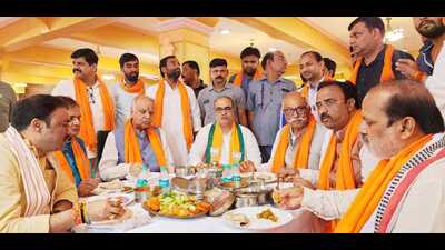 UP BJP chief Bhupendra Chaudhary and other party leaders at a tiffin meeting in Lucknow on Monday (HT Photo) UP BJP chief Bhupendra Chaudhary and other party leaders at a tiffin meeting in Lucknow on Monday (HT Photo)