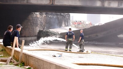 Firefighters work at a collapsed portion of Interstate 95, caused by a large vehicle fire, in Philadelphia, Pennsylvania, on June 11, 2023. (AFP) Firefighters work at a collapsed portion of Interstate 95, caused by a large vehicle fire, in Philadelphia, Pennsylvania, on June 11, 2023. (AFP)