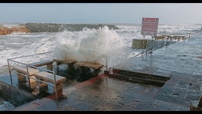 Waves crash against the beachline ahead of the landfall of Cyclone Biparjoy, in Dwarka district, Sunday. (PTI) Waves crash against the beachline ahead of the landfall of Cyclone Biparjoy, in Dwarka district, Sunday. (PTI)