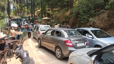 Dhanaulti, a captivating hill station located at an impressive altitude of 7,500 feet above sea level, is highly sought-after by tourists. It attracts a significant number of visitors during both winter and summer seasons. Over the weekend, Dhanaulti welcomed more than 1,800 tourists, highlighting its popularity among travellers. Whether you visit the scenic vistas or the enjoyable activities, be prepared for a vibrant atmosphere and a considerable crowd. (ANI photo) Dhanaulti, a captivating hill station located at an impressive altitude of 7,500 feet above sea level, is highly sought-after by tourists. It attracts a significant number of visitors during both winter and summer seasons. Over the weekend, Dhanaulti welcomed more than 1,800 tourists, highlighting its popularity among travellers. Whether you visit the scenic vistas or the enjoyable activities, be prepared for a vibrant atmosphere and a considerable crowd. (ANI photo)