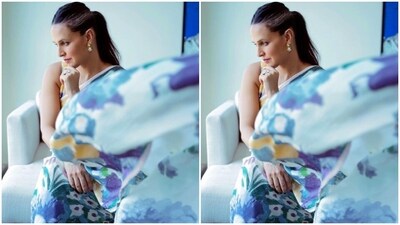 In a matching sleeveless blouse, Neha completed her ethnic look for the day. In minimal earrings and rings from Isharya, Neha further accessorised her look for the day. (Instagram/@nehadhupia) In a matching sleeveless blouse, Neha completed her ethnic look for the day. In minimal earrings and rings from Isharya, Neha further accessorised her look for the day. (Instagram/@nehadhupia)