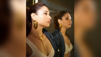 With the assistance of hair stylist Seema Mane, Tamannaah chose a chic high ponytail hairstyle which exuded a stylish and elegant vibe, accentuating her facial features and adding a touch of sophistication to her overall look. (Instagram/@tamannaahspeaks) With the assistance of hair stylist Seema Mane, Tamannaah chose a chic high ponytail hairstyle which exuded a stylish and elegant vibe, accentuating her facial features and adding a touch of sophistication to her overall look. (Instagram/@tamannaahspeaks)