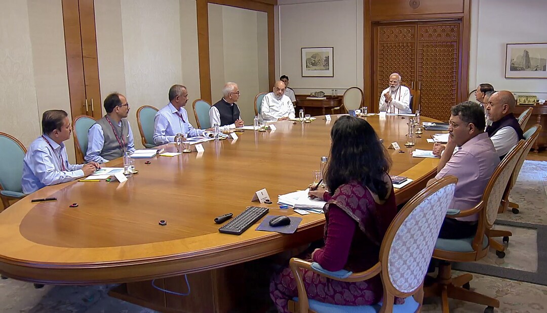 Prime Minister Narendra Modi holds a meeting to review the situation related to Cyclone Biparjoy, in New Delhi on Monday. Union Home Minister Amit Shah, Union Home Secretary Ajay Bhalla and Principal Secretary to Prime Minister PK Mishra are also present. (ANI Photo)