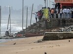 People gathered at a corner at Juhu Beach. People gathered at a corner at Juhu Beach.