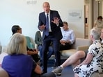Britain's Prince William, Prince of Wales talks with outpatients as he visits The Royal Marsden NHS Foundation Trust's Oak Cancer Centre, in Sutton, south London on June 8, 2023, where he officially opened the centre. (Photo by Kin Cheung / POOL / AFP)
