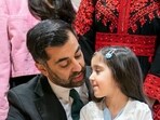 Newly elected leader of the Scottish National Party, Humza Yousaf with his his daughter Amal after signing the nomination form to become First Minister for Scotland, at the Scottish Parliament in Edinburgh, on March 28. 