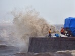 High tides crash at the seafront at Colaba, Mumbai as an after-effect of the forming of the cyclone.