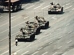 Iconic image. A lone demonstrator blocks the path of a tank convoy along the Avenue of Eternal Peace near Tiananmen Square in June 1989. Iconic image. A lone demonstrator blocks the path of a tank convoy along the Avenue of Eternal Peace near Tiananmen Square in June 1989.