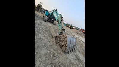 A poclain machine seized from an illegal sand mining site in Pathankot.