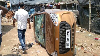 A vehicle is damaged after violence erupted in South 24 Parganas district. (ANI) A vehicle is damaged after violence erupted in South 24 Parganas district. (ANI)