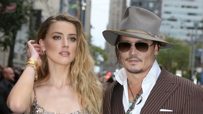 Amber Heard and Johnny Depp (Shutterstock) Amber Heard and Johnny Depp (Shutterstock)