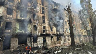 An emergency worker at a multi-storey building site after it was hit by Russian missiles in Kryvyi Rih, Ukraine, on Tuesday. (AP) An emergency worker at a multi-storey building site after it was hit by Russian missiles in Kryvyi Rih, Ukraine, on Tuesday. (AP)