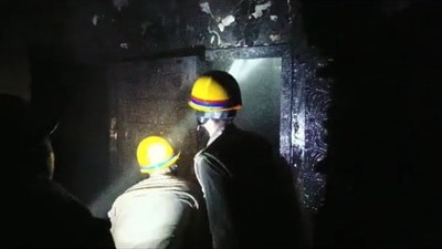 Firemen at the scene of the fire in Krishna Nagar area of Lucknow, in the wee hours of Tuesday (Sourced)