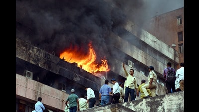 Firemen douse fire that broke out on the third floor of Satpura Bhawan, in Bhopal. (PTI) Firemen douse fire that broke out on the third floor of Satpura Bhawan, in Bhopal. (PTI)
