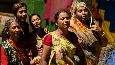 Distressed family members and relatives of the boys at the Juhu Koliwada beach, in Mumbai on Monday, (Anshuman Poyrekar/ HT)