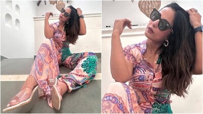 Hina styled the dual-toned outfit with sunnies, hoop earrings, peep-toe sandals, a watch, and rings. Lastly, she chose open wavy locks, a brown lip shade, and minimal makeup for the glam picks. (Instagram) Hina styled the dual-toned outfit with sunnies, hoop earrings, peep-toe sandals, a watch, and rings. Lastly, she chose open wavy locks, a brown lip shade, and minimal makeup for the glam picks. (Instagram)