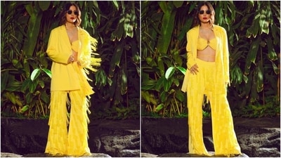 Hina posted another summer-ready look on Instagram, and it is the ultimate party look you need to beat the heat. She wore a sunshine yellow-coloured oversized blazer and pants set adorned with hand-embroidered tassels. A matching bralette with a plunging neckline and wrap-around straps completed the outfit. (Instagram) Hina posted another summer-ready look on Instagram, and it is the ultimate party look you need to beat the heat. She wore a sunshine yellow-coloured oversized blazer and pants set adorned with hand-embroidered tassels. A matching bralette with a plunging neckline and wrap-around straps completed the outfit. (Instagram)