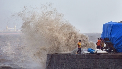High tides crash at the seafront at Colaba, Mumbai as an after-effect of the forming of the cyclone. (PTI) High tides crash at the seafront at Colaba, Mumbai as an after-effect of the forming of the cyclone. (PTI)