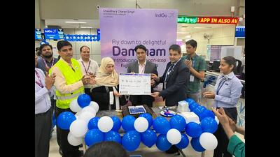 Passengers and Lucknow airport officials at the launch of the Lko-Dammam fight on Tuesday (HT Photo)