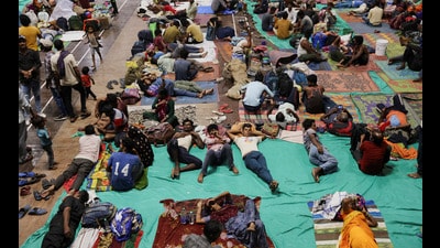 People evacuated from Kandla port at a shelter in Gandhidham, Gujarat, on Tuesday. (REUTERS) People evacuated from Kandla port at a shelter in Gandhidham, Gujarat, on Tuesday. (REUTERS)