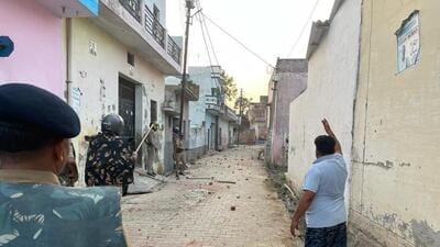 Police personnel deployed at Belda village in Roorkee, Haridwar. (HT Photo) Police personnel deployed at Belda village in Roorkee, Haridwar. (HT Photo)