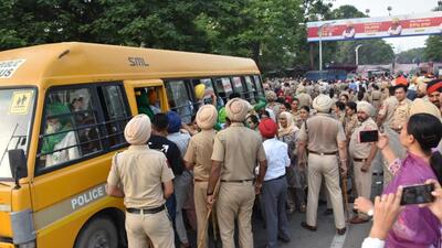 Protesters being taken away from the Punjab State Power Corporation Limited (PSPCL) headquarters in Patiala on Tuesday morning. (HT Photo) Protesters being taken away from the Punjab State Power Corporation Limited (PSPCL) headquarters in Patiala on Tuesday morning. (HT Photo)