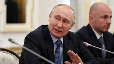 Russian President Vladimir Putin attends a meeting with war correspondents at the Kremlin in Moscow, Russia on Tuesday, June 13. (via REUTERS)