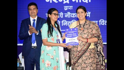 Union minister for women and child development Smriti Irani with a candidate at a job fair in Lucknow on Tuesday. (Deepak Gupta/HT photo) Union minister for women and child development Smriti Irani with a candidate at a job fair in Lucknow on Tuesday. (Deepak Gupta/HT photo)