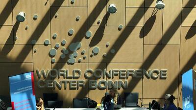Visitors sit inside the World Conference Center Bonn during the Climate Change Conference in Bonn, western Germany on June 13, 2023. (AFP) Visitors sit inside the World Conference Center Bonn during the Climate Change Conference in Bonn, western Germany on June 13, 2023. (AFP)