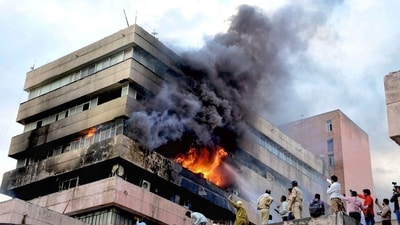 Firemen douse fire that broke out on the third floor of Satpura Bhawan, a building housing offices of various departments of the Madhya Pradesh government, in Bhopal, Monday, June 12, 2023. (PTI) Firemen douse fire that broke out on the third floor of Satpura Bhawan, a building housing offices of various departments of the Madhya Pradesh government, in Bhopal, Monday, June 12, 2023. (PTI)