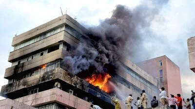 Firemen douse fire that broke out on the third floor of Satpura Bhawan, a building housing offices of various departments of the Madhya Pradesh government, in Bhopal, Monday, June 12, 2023. (PTI)