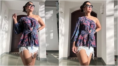 Hina posted the pictures with a blue heart emoji. The pictures show her soaking up the vitamin D in an indigo blue one-shoulder top featuring a full-length sleeve, floral pattern in pink, green and blue shades, a peplum silhouette, waist cinched with a ribbon tie and pleats on the hem. (Instagram) Hina posted the pictures with a blue heart emoji. The pictures show her soaking up the vitamin D in an indigo blue one-shoulder top featuring a full-length sleeve, floral pattern in pink, green and blue shades, a peplum silhouette, waist cinched with a ribbon tie and pleats on the hem. (Instagram)