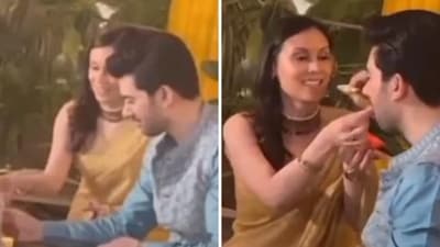 Karan Deol and Drisha Acharya were seen feeding cake to each other in the video. Karan Deol and Drisha Acharya were seen feeding cake to each other in the video.