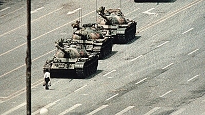 Iconic image. A lone demonstrator blocks the path of a tank convoy along the Avenue of Eternal Peace near Tiananmen Square in June 1989. (Getty Images) Iconic image. A lone demonstrator blocks the path of a tank convoy along the Avenue of Eternal Peace near Tiananmen Square in June 1989. (Getty Images)