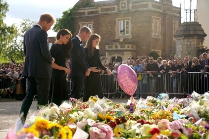 Prince Harry and Prince William with Meghan Markle and Kate Middleton viewed the floral tributes, notes, balloons and more left by the well-wishers in honour of the late Queen Elizabeth II. The Queen died on September 8, 2022, at Balmoral Castle, aged 96, after reigning for 70 years. Her family gathered at her Scottish estate after concerns about her health grew earlier on Thursday. (AFP) Prince Harry and Prince William with Meghan Markle and Kate Middleton viewed the floral tributes, notes, balloons and more left by the well-wishers in honour of the late Queen Elizabeth II. The Queen died on September 8, 2022, at Balmoral Castle, aged 96, after reigning for 70 years. Her family gathered at her Scottish estate after concerns about her health grew earlier on Thursday. (AFP)