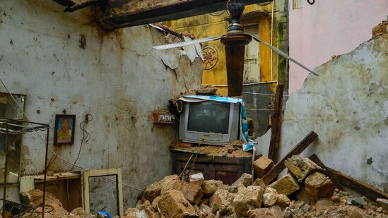 A view of a damaged house due to heavy rainfall and strong winds ahead of Cyclone Biparjoy’s expected landfall in Porbandar, on June 13.(PTI)
