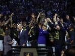 Denver Nuggets owner Stan Kroenke raises the trophy after a 94-89 victory against the Miami Heat in Game Five of the 2023 NBA Finals Denver Nuggets owner Stan Kroenke raises the trophy after a 94-89 victory against the Miami Heat in Game Five of the 2023 NBA Finals