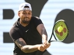 Australia's Nick Kyrgios returns the ball to China's Wu Yibing during the Stuttgart tennis tournament, Germany, Tuesday, June 13, 2023. (Marijan Murat/dpa via AP)