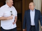 Russian President Vladimir Putin, left, and Belarusian President Alexander Lukashenko speak during their meeting at the Bocharov Ruchei residence in the resort city of Sochi, Russia, Friday, June 9, 2023. 