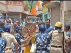 Security personnel trying to control the situation in Bankura where clashes erupted between TMC and BJP workers. 