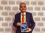 Reserve Bank of India (RBI) Governor Shaktiknata Das poses for photos after receiving the 'Governor of the Year' award by Central Banking, in London, United Kingdom, Tuesday.