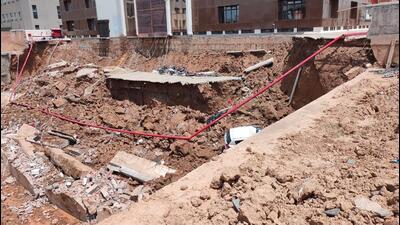 As many as 16 vehicles, including 15 bikes and a car, were damaged after the pavement of a building caved-in due to digging in the adjoining plot in Sector-83 on Wednesday. Fortunately, no one was injured. (HT Photo) As many as 16 vehicles, including 15 bikes and a car, were damaged after the pavement of a building caved-in due to digging in the adjoining plot in Sector-83 on Wednesday. Fortunately, no one was injured. (HT Photo)