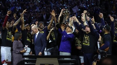 Denver Nuggets owner Stan Kroenke raises the trophy after a 94-89 victory against the Miami Heat in Game Five of the 2023 NBA Finals (Getty Images via AFP) Denver Nuggets owner Stan Kroenke raises the trophy after a 94-89 victory against the Miami Heat in Game Five of the 2023 NBA Finals (Getty Images via AFP)