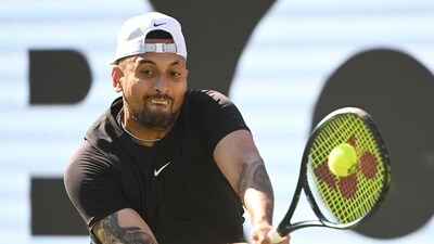 Australia's Nick Kyrgios returns the ball to China's Wu Yibing during the Stuttgart tennis tournament, Germany, Tuesday, June 13, 2023. (Marijan Murat/dpa via AP) (AP)